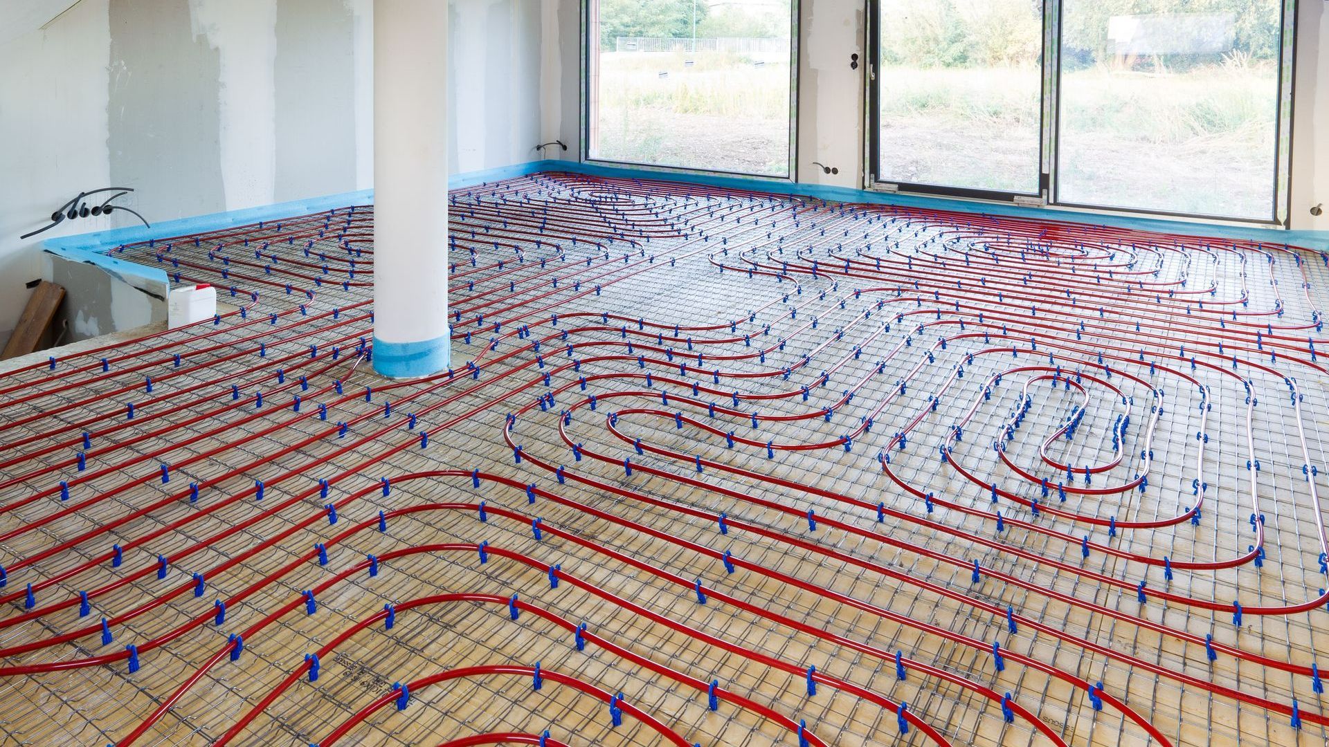 Plancher chauffant en cours d'installation