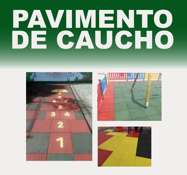 Un cartel verde que dice pavimento de caucho.