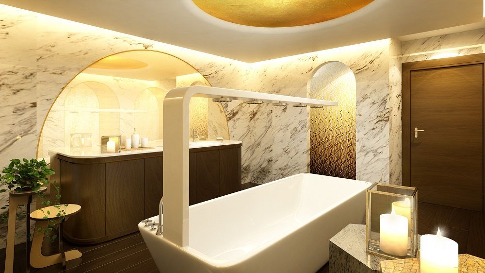 Un baño con bañera y velas.