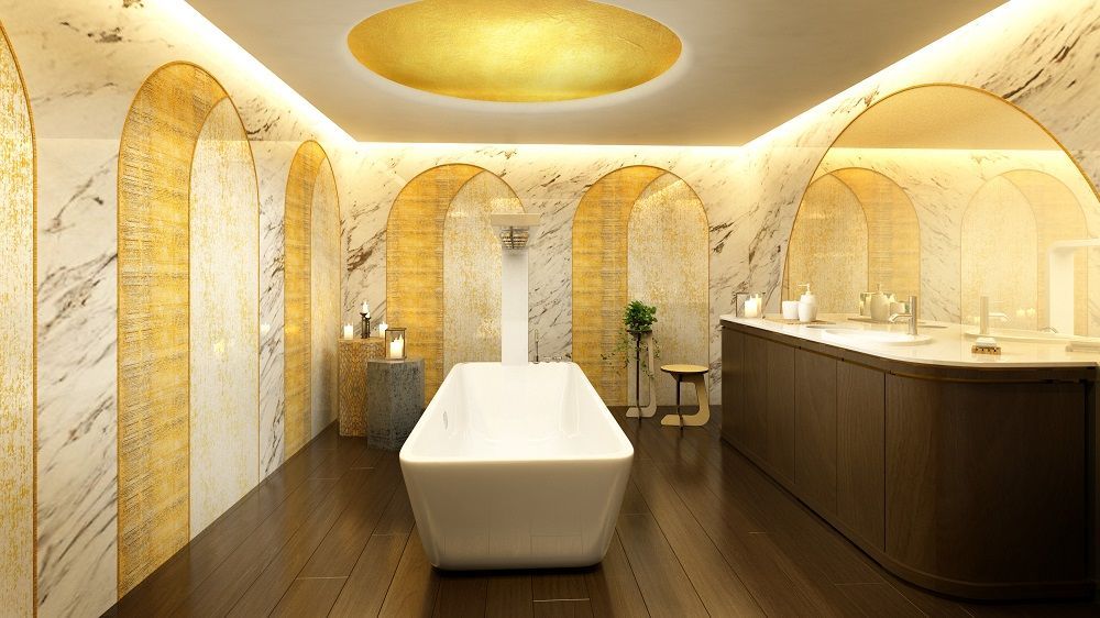 Hay una bañera grande en el medio del baño.