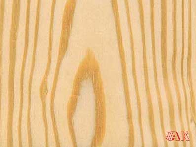 Eine Nahaufnahme eines Holzstücks mit Maserung.