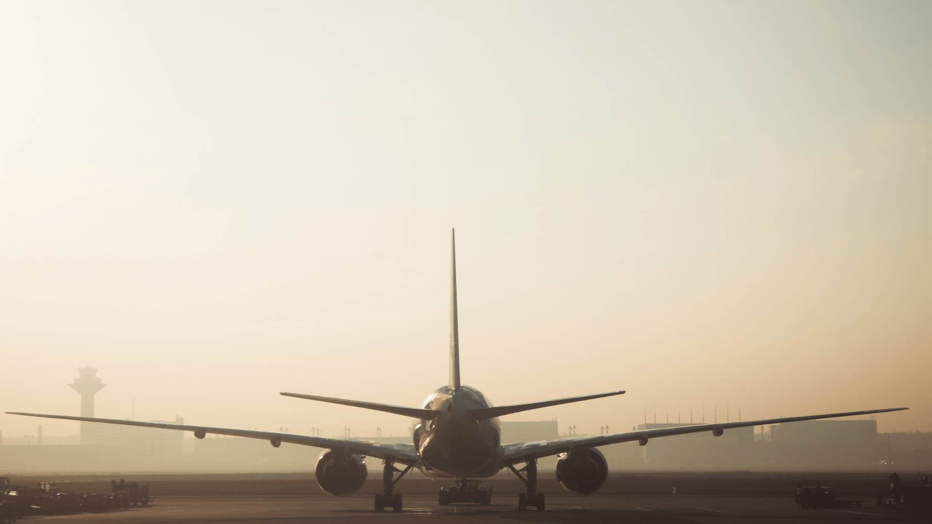 Rear view of airplane on runway bound for Deadwood, South Dakota