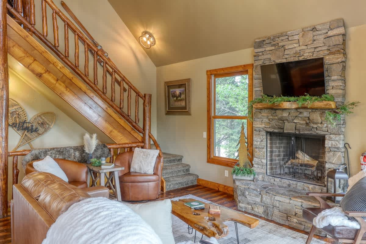 Great Escape's cozy living room with fireplace