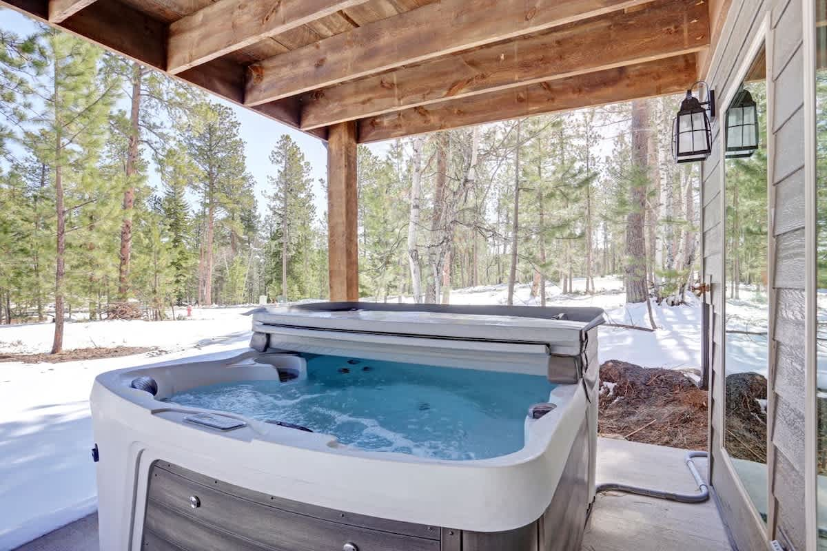 Moose Creek Retreat's private outdoor hot tub perfect for all seasons