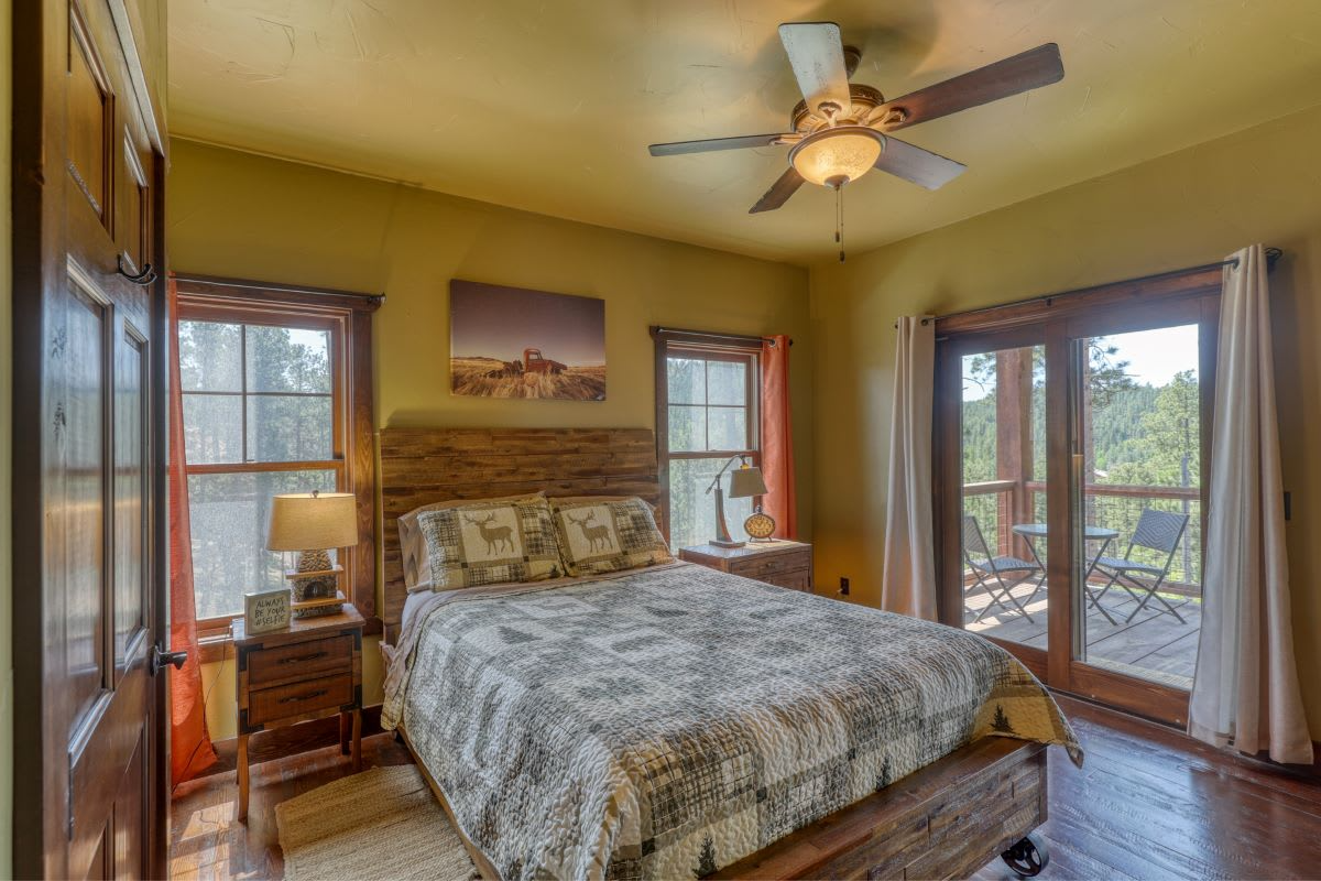 Prospector's Lookout's cozy bedroom interiors  in the Black Hills