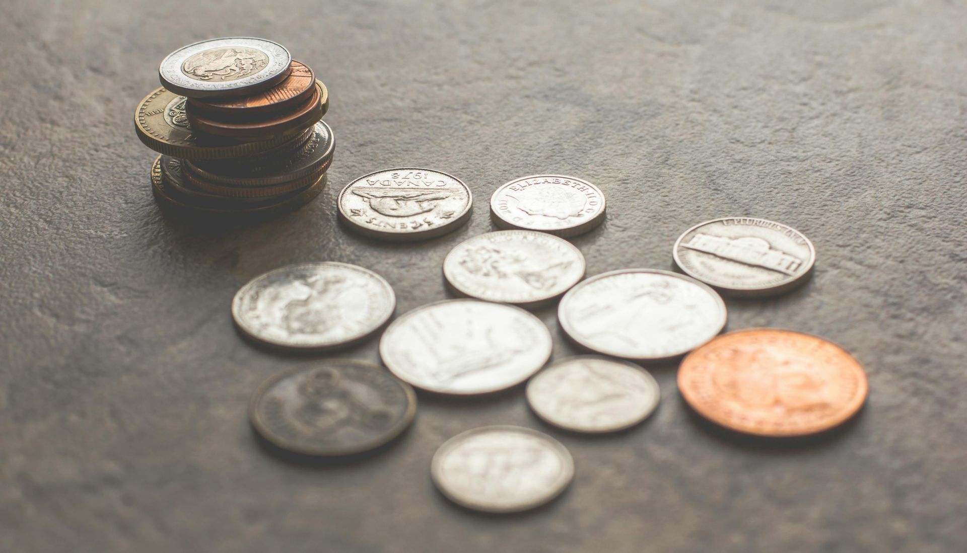 Tokens stacked on top of one another and scattered across a table
