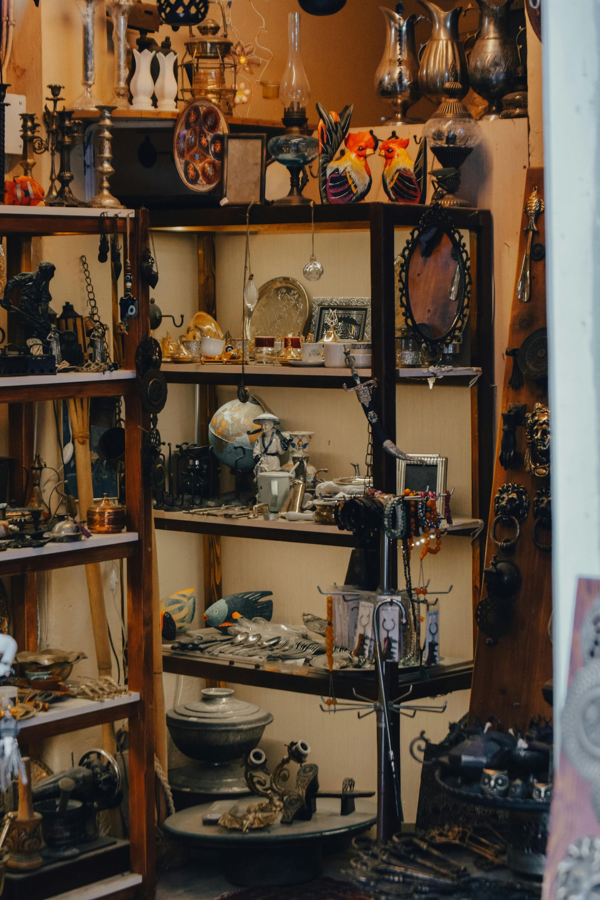 Shelves full of artifacts for purchase at an antique shop