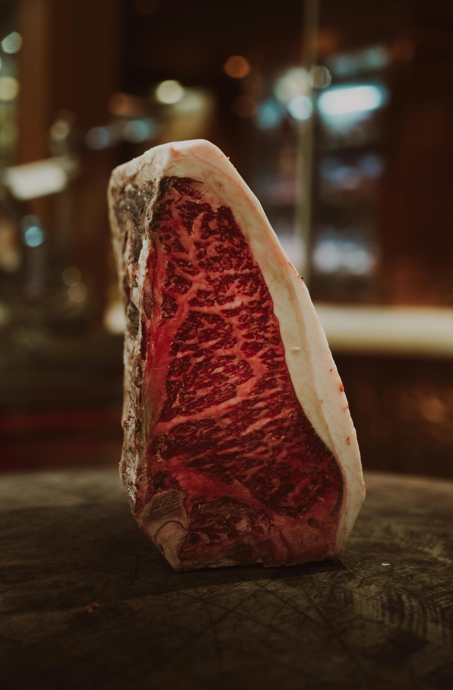 Large steak ready to be cooked at a family-friendly steakhouse