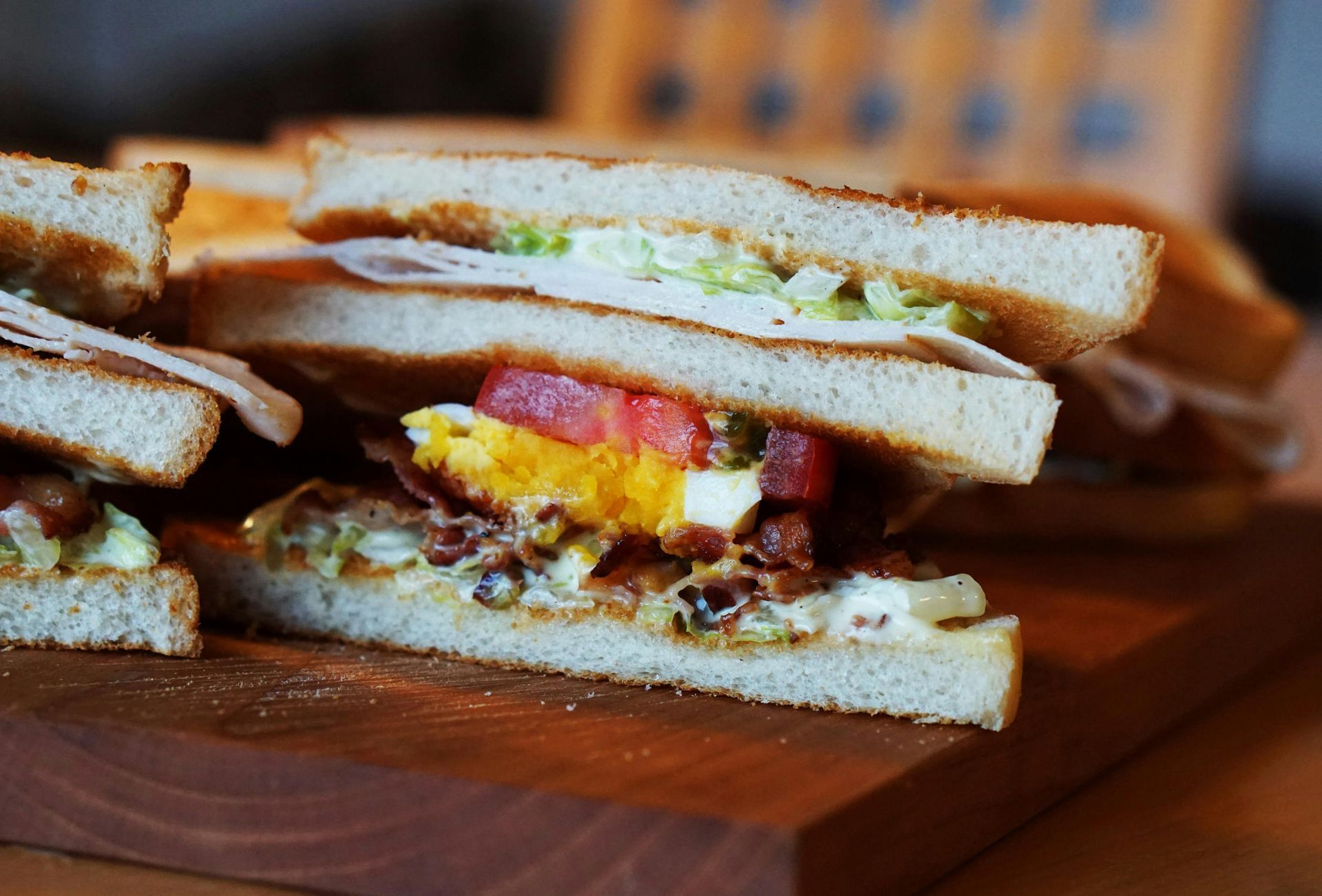 Sandwich resting on top of a table ready to be savored