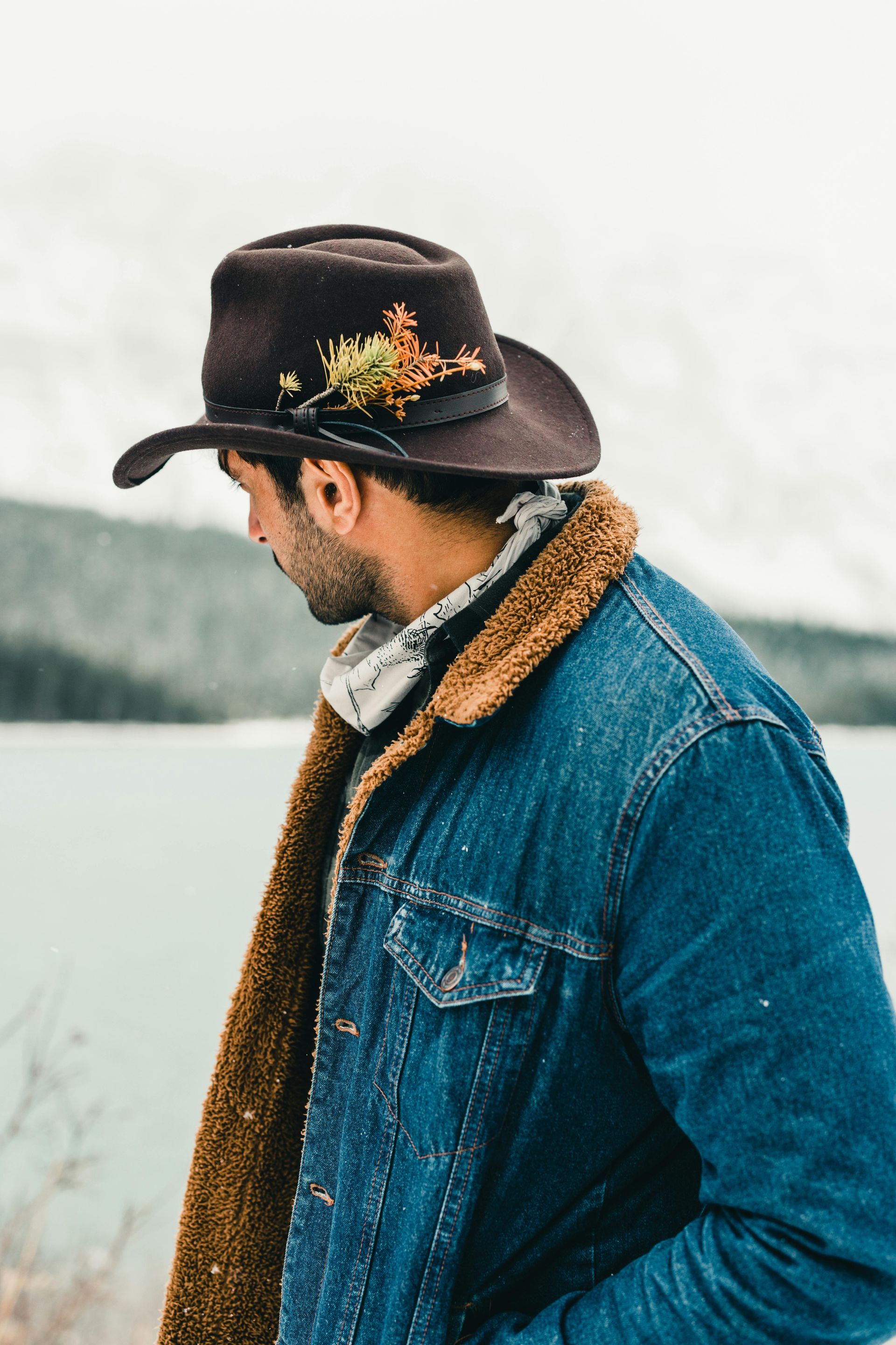 Man in layered clothing while outside in the colder wilderness in South Dakota