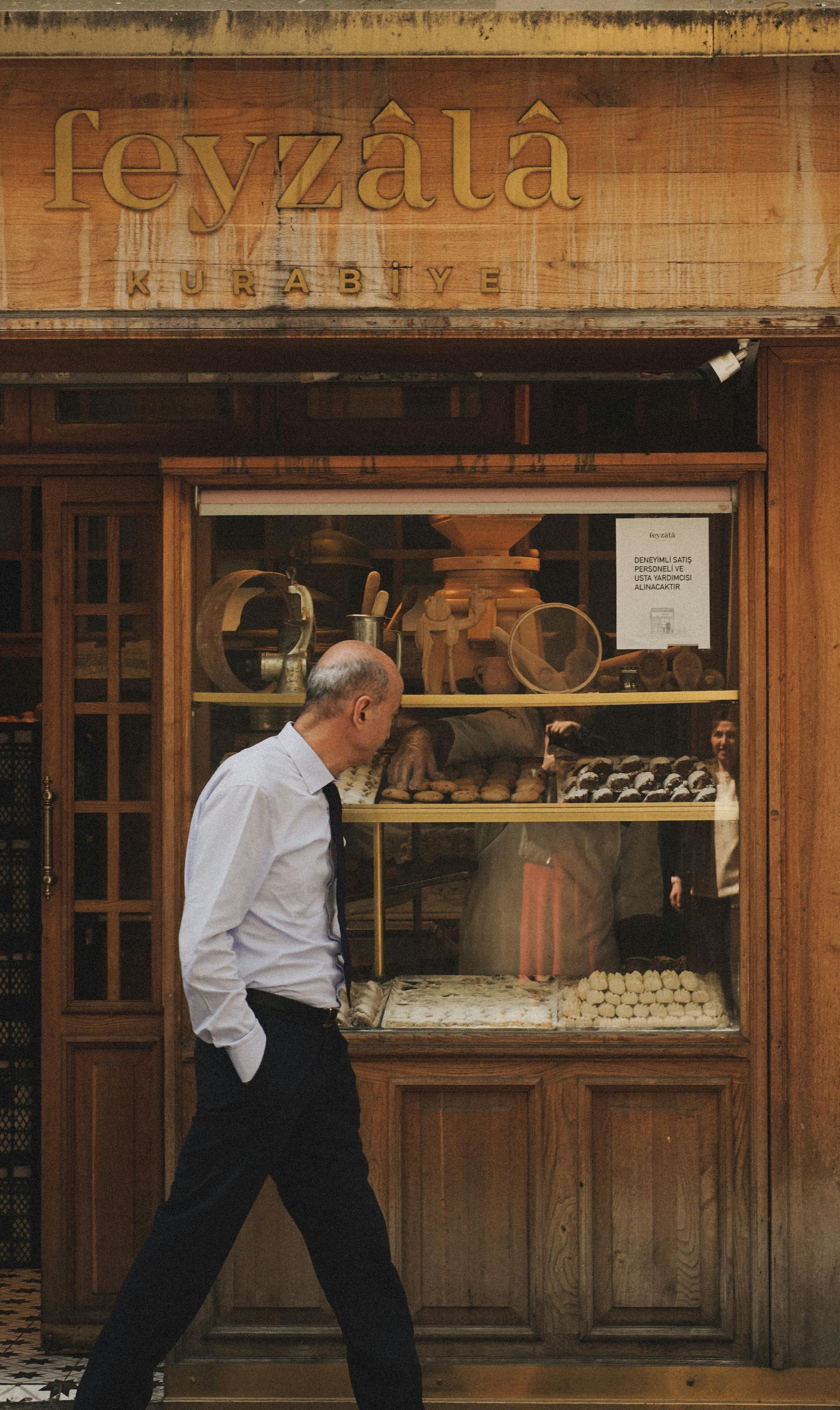 Older gentleman admiring the relics in a museum display
