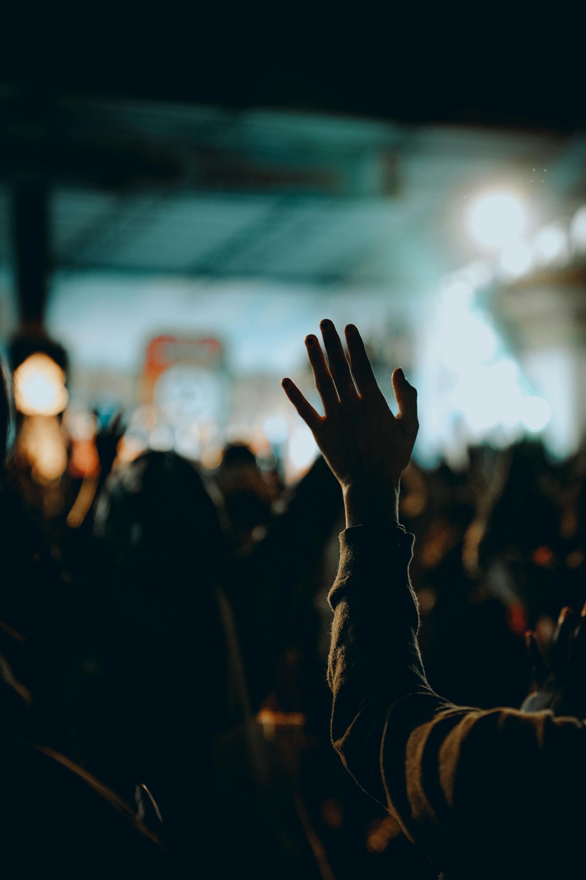 Group of people enjoying live music at a venue 