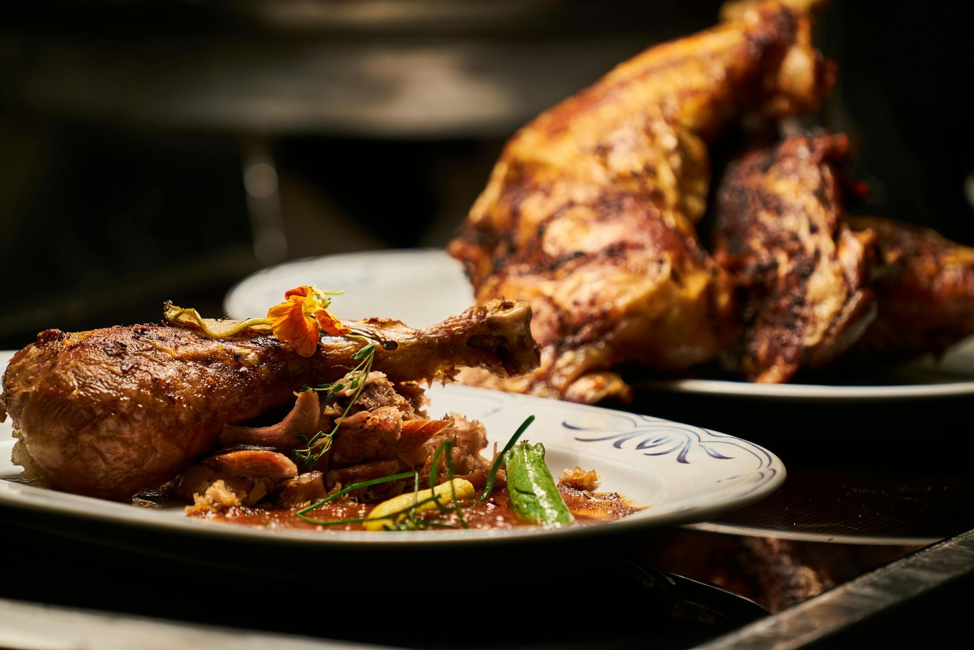 Roasted chicken dinner on a plate ready to be savored