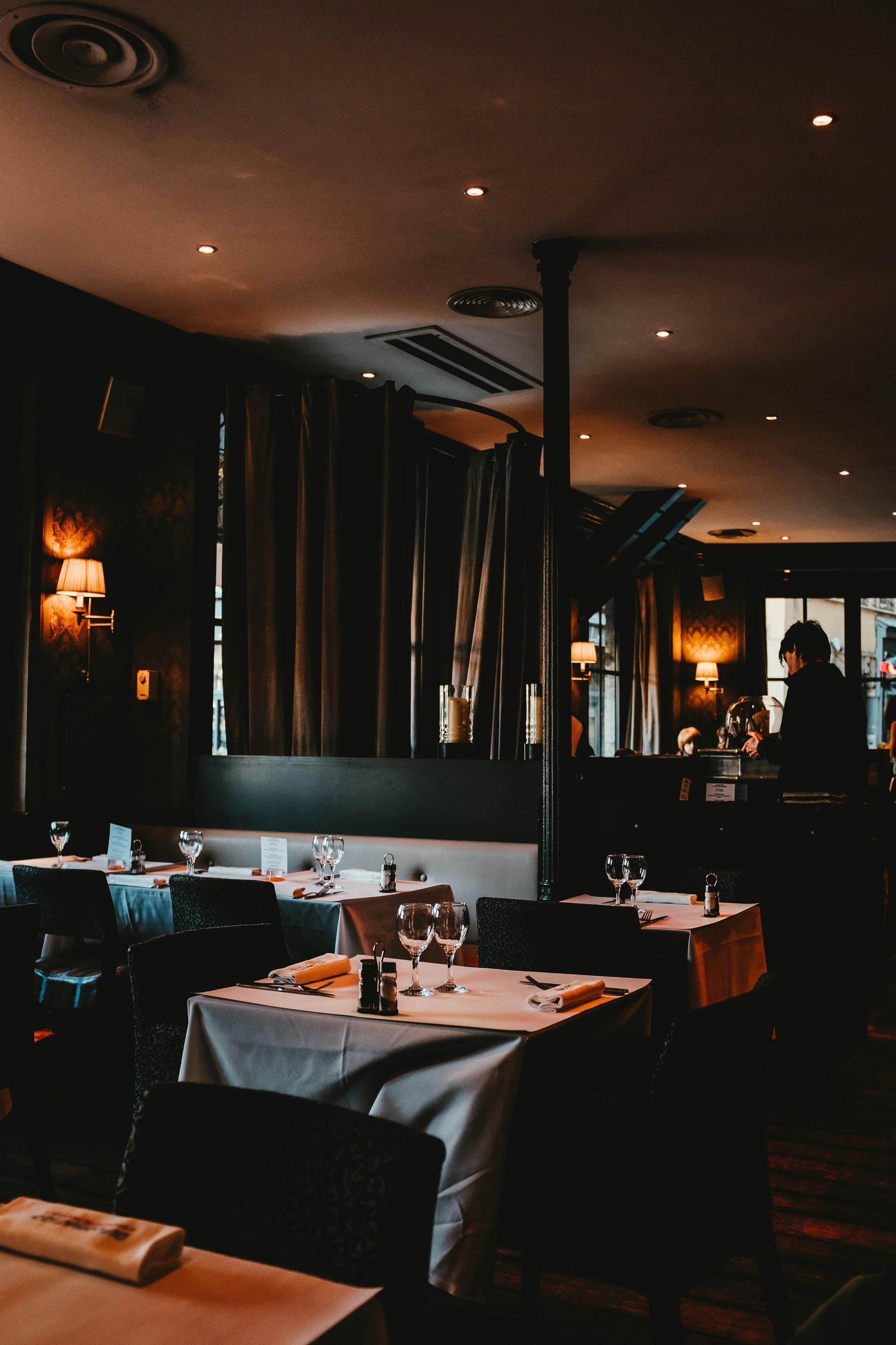 Fine dining restaurant with private tables and low light setting