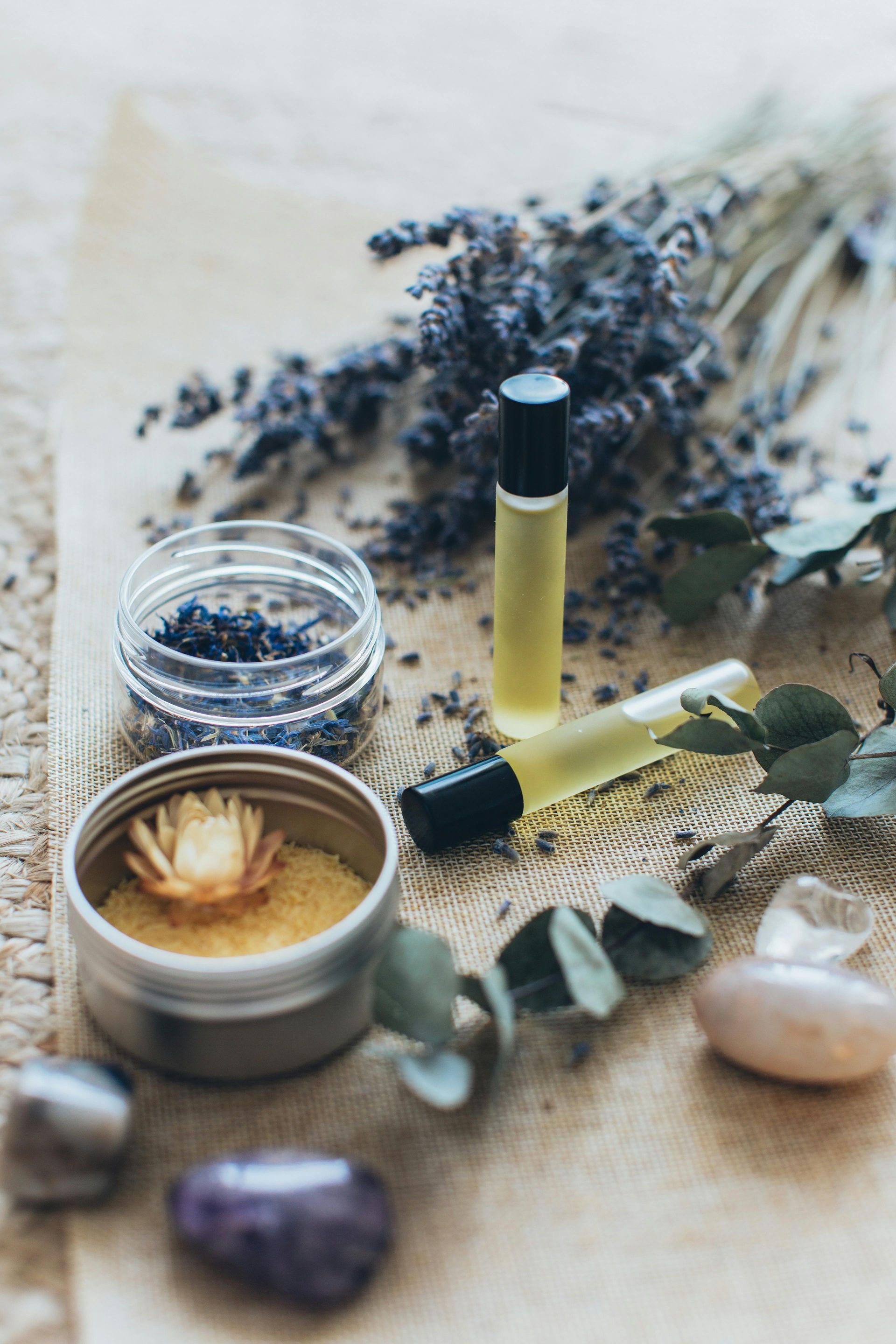Group of lavender on a spa table surrounded by fresh fragrances 