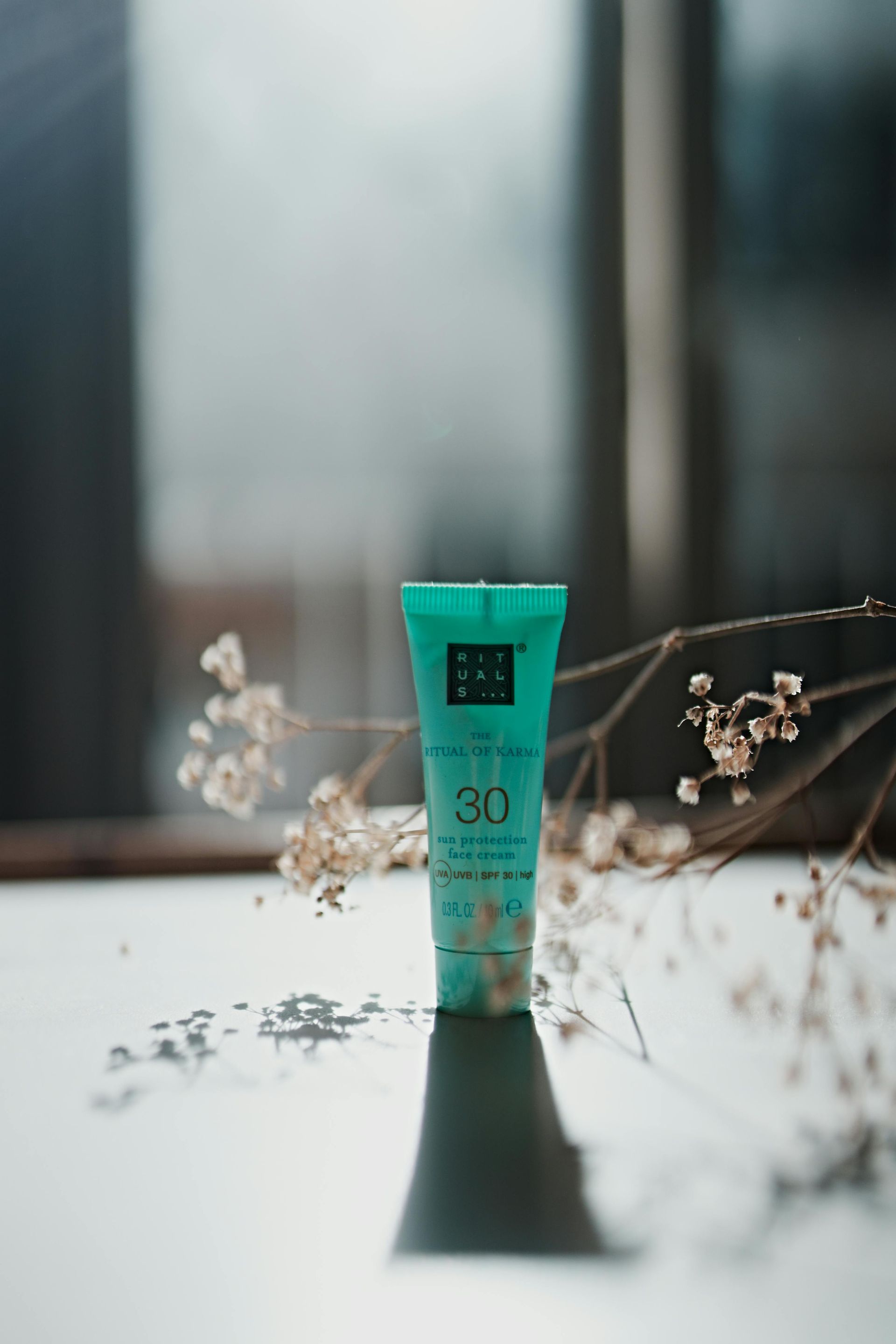 Sunscreen sitting on table ready to be used