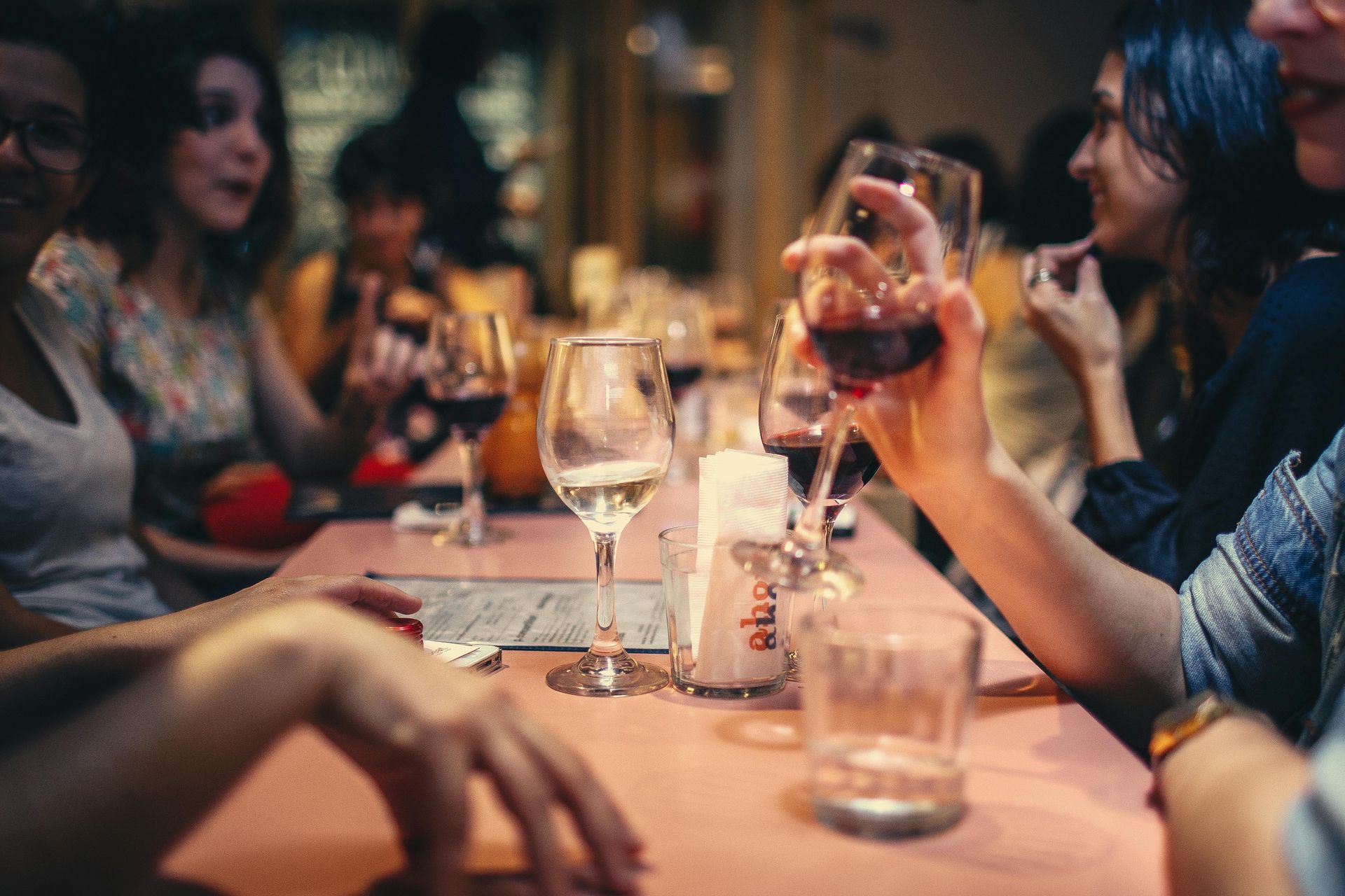 People enjoying time together with glasses of wine