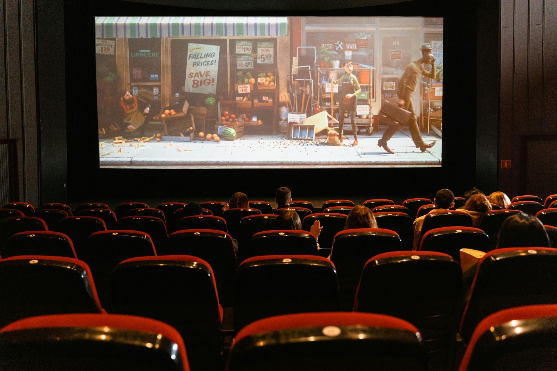 Movie theater with an old western movie playing on the screen