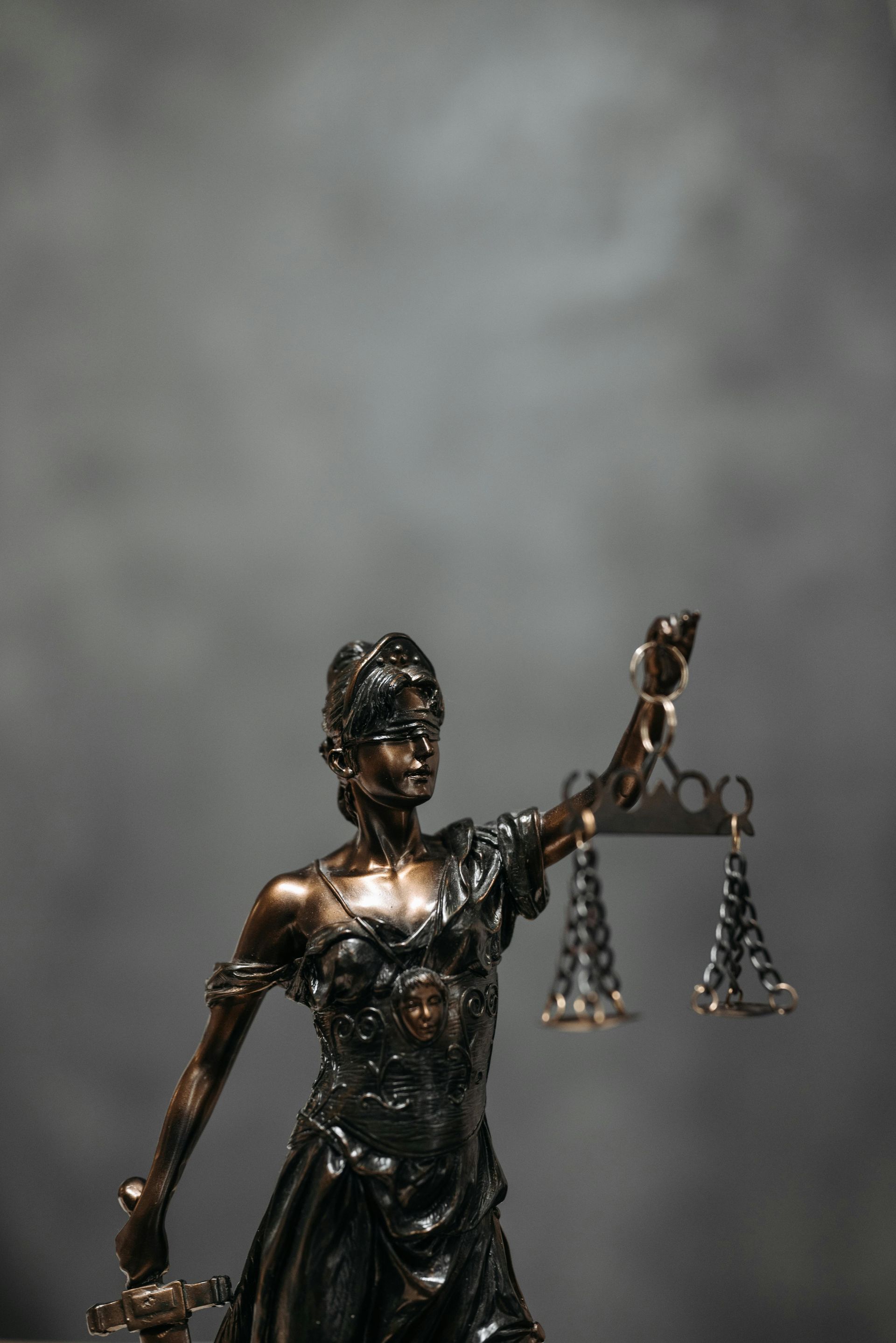 Lady of Justice scale with blurred background