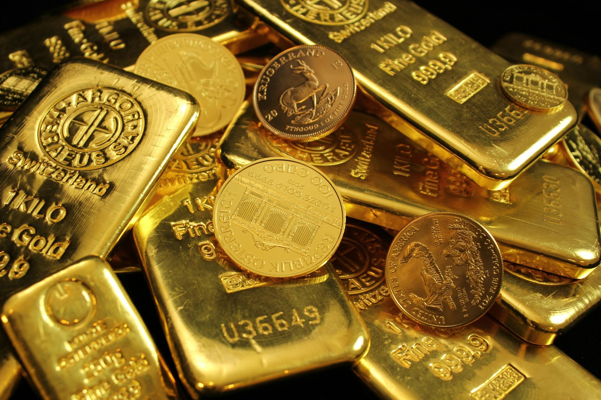 Gold blocks and coins stacked on tops of each other 