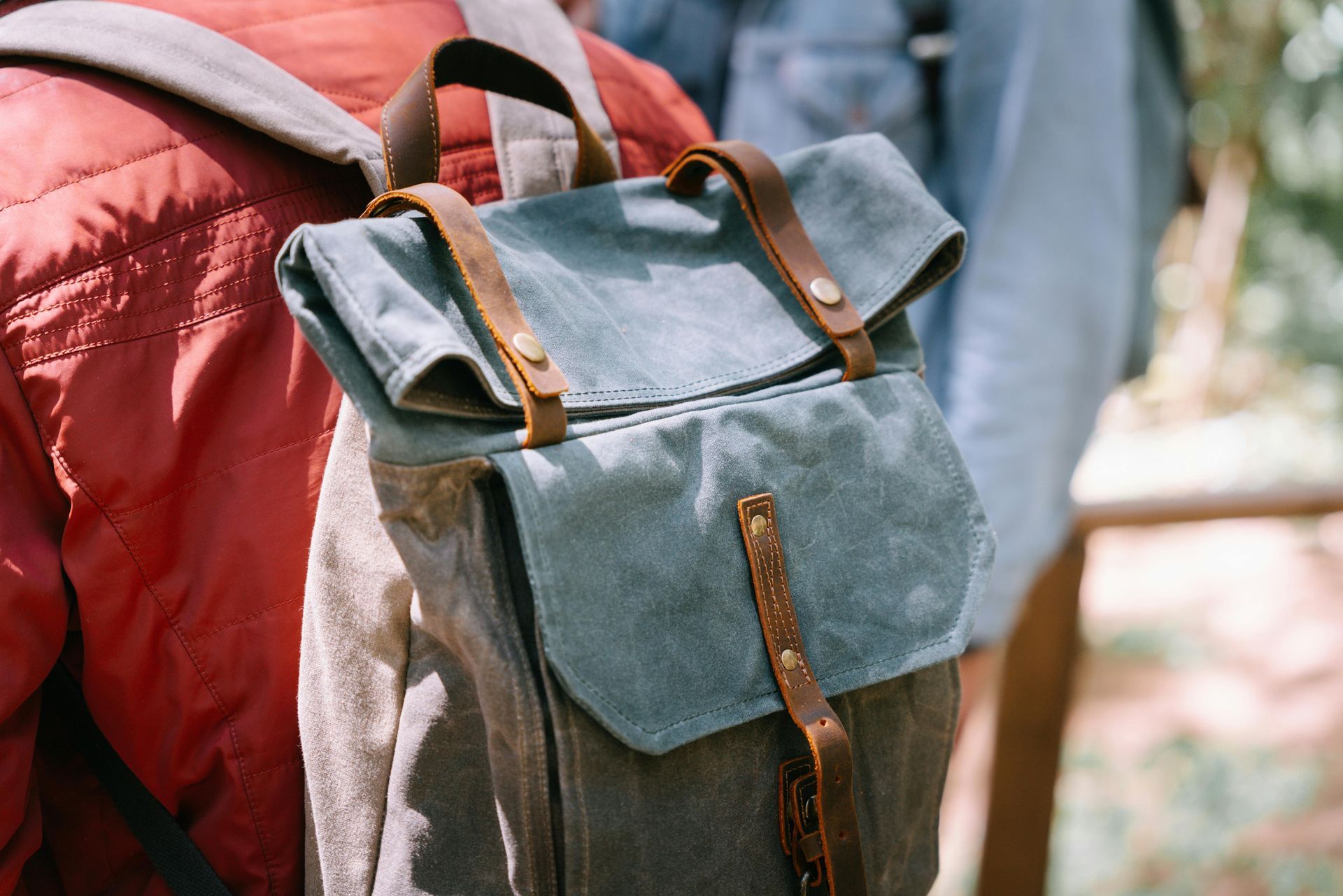 Person carrying backpack while wildlife viewing outdoors