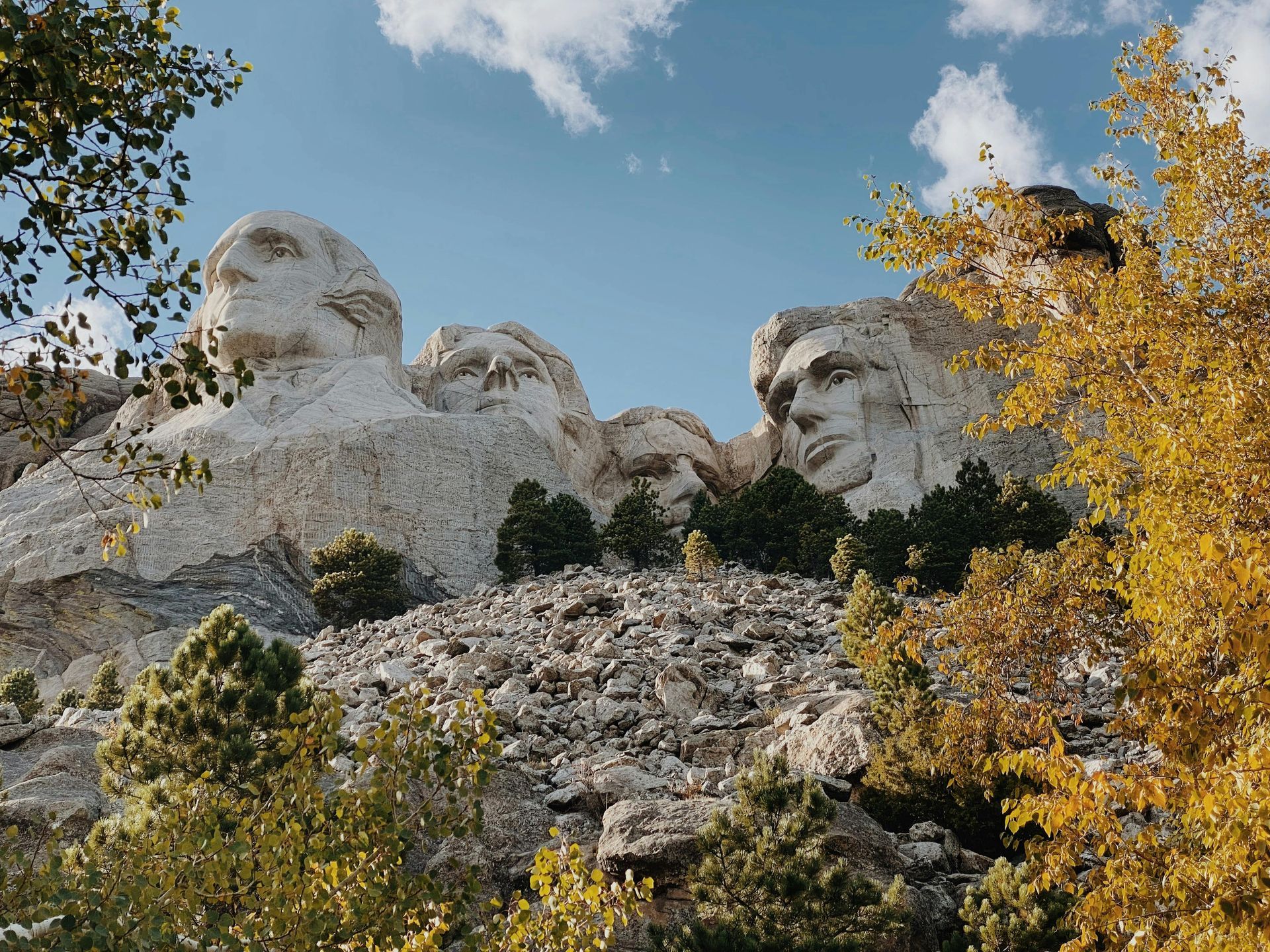 Ground view of Mount Rushmore in SD on a beautiful, sunny fall day