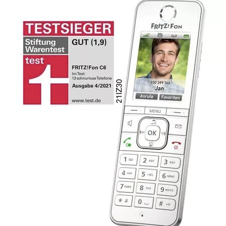 ein fritz ! fon c6 ist ein schnurloses Telefon mit einem Bild eines Mannes auf dem Bildschirm .