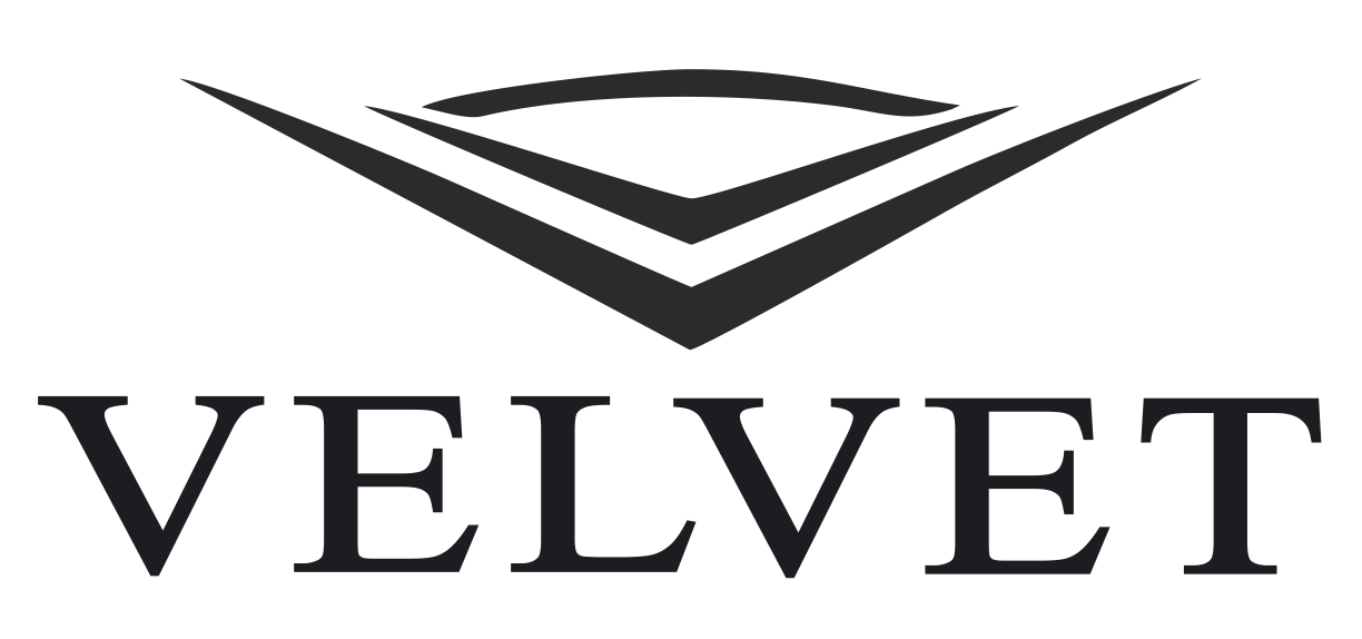 Logotipo de VELVET con emblema de chevr&oacute;n negro estilizado sobre el nombre de la marca.