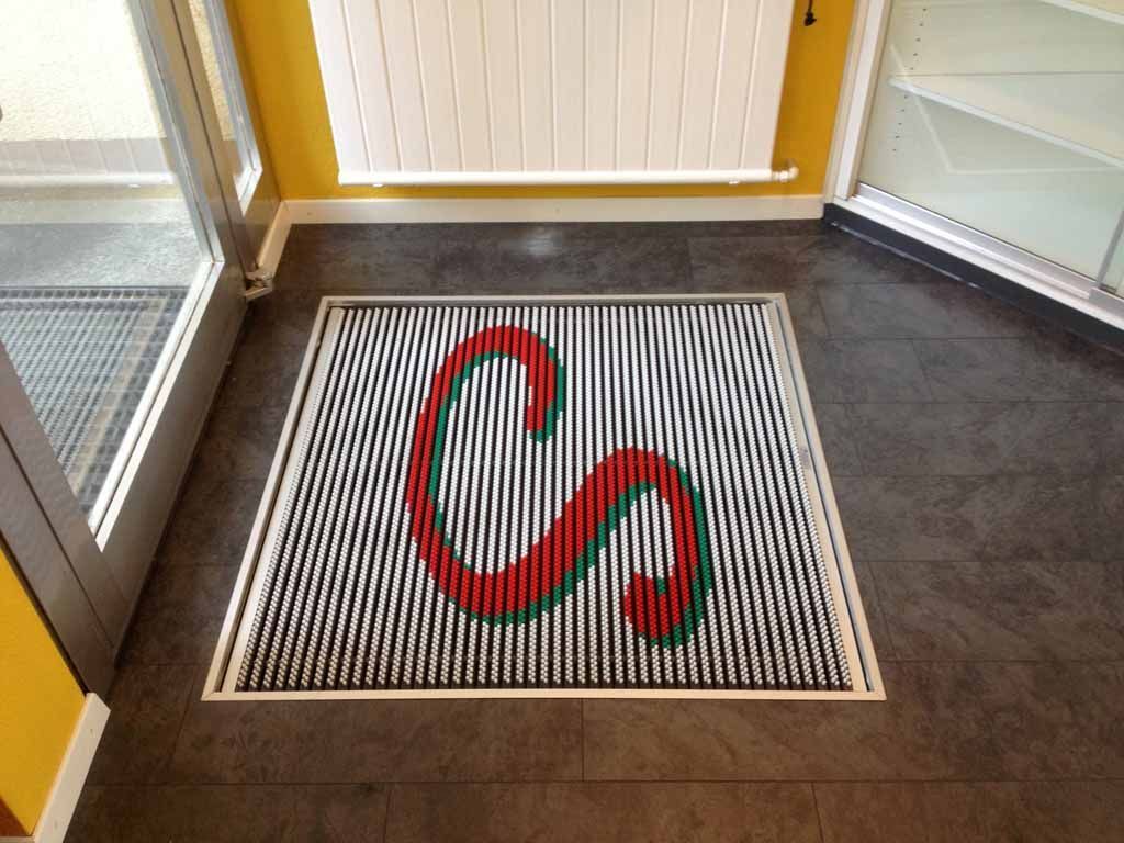 Schmutzschleusen - Bürstenmatte Logo Schweizer