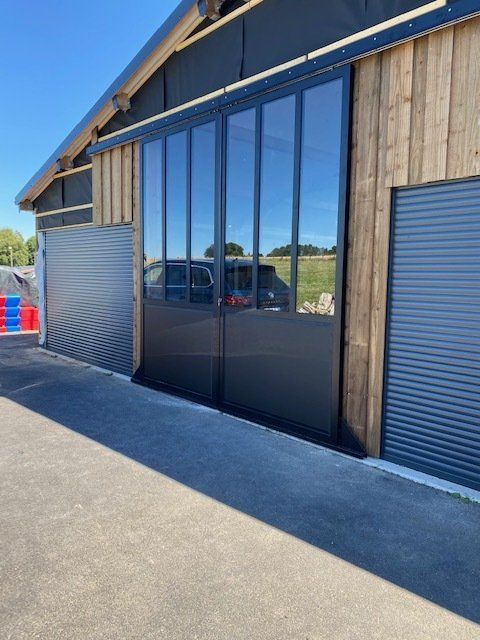 Porte de grange coulissante fer et verre