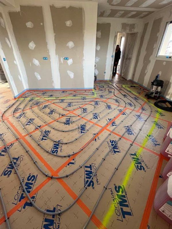 Plancher chauffant installé dans une construction neuve