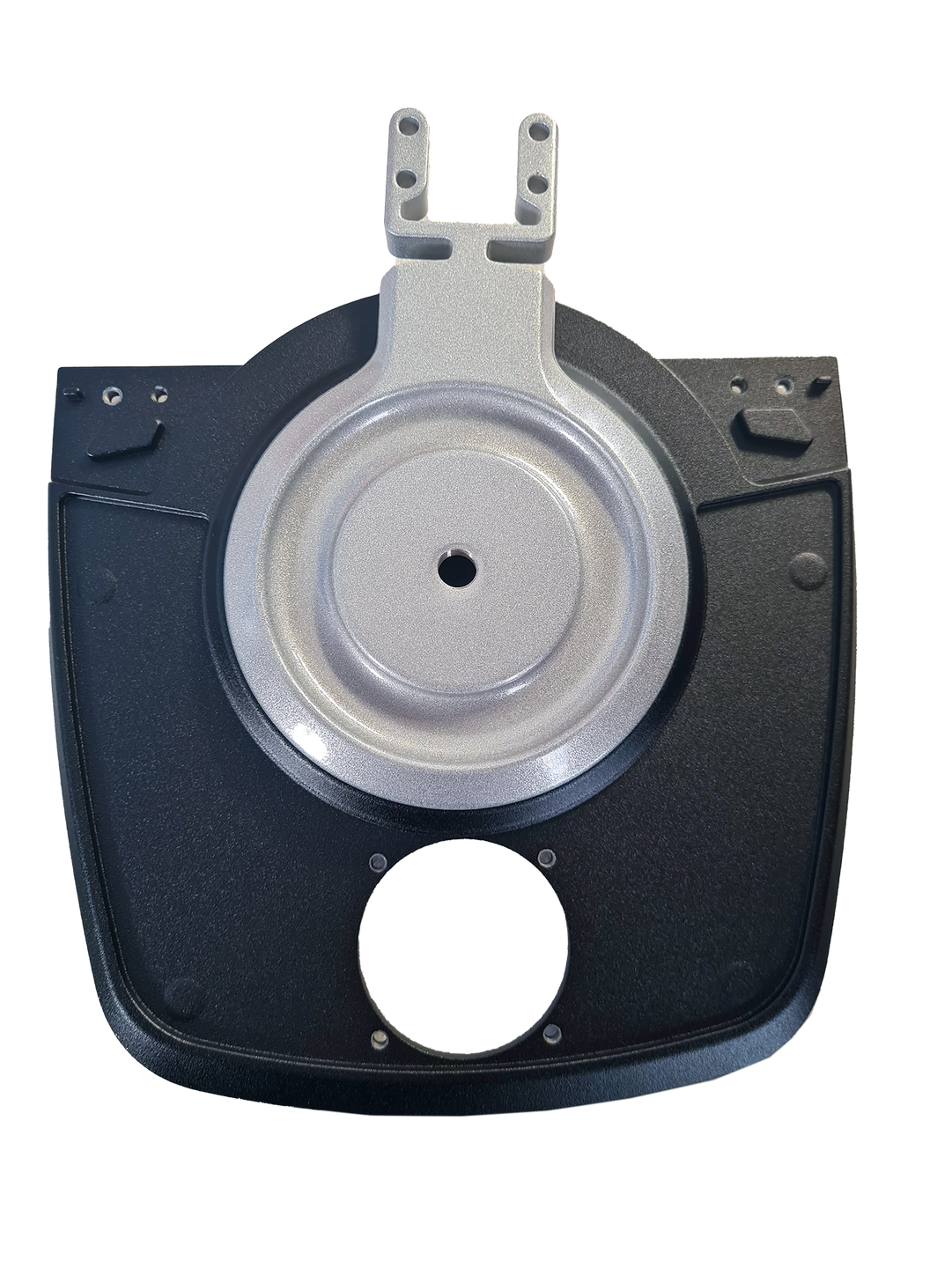 Ein schwarz-silbernes Objekt mit einem Loch in der Mitte