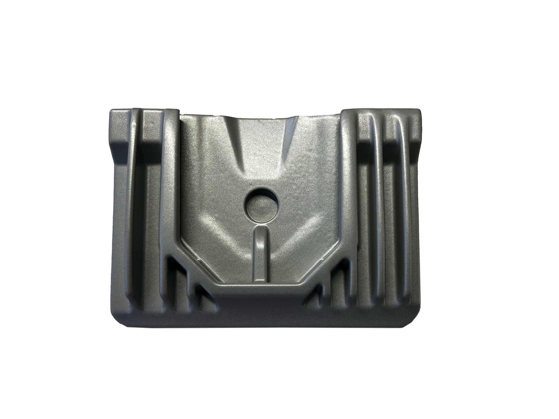 Eine Nahaufnahme eines Metallobjekts mit einem Loch in der Mitte auf einem weißen Hintergrund.