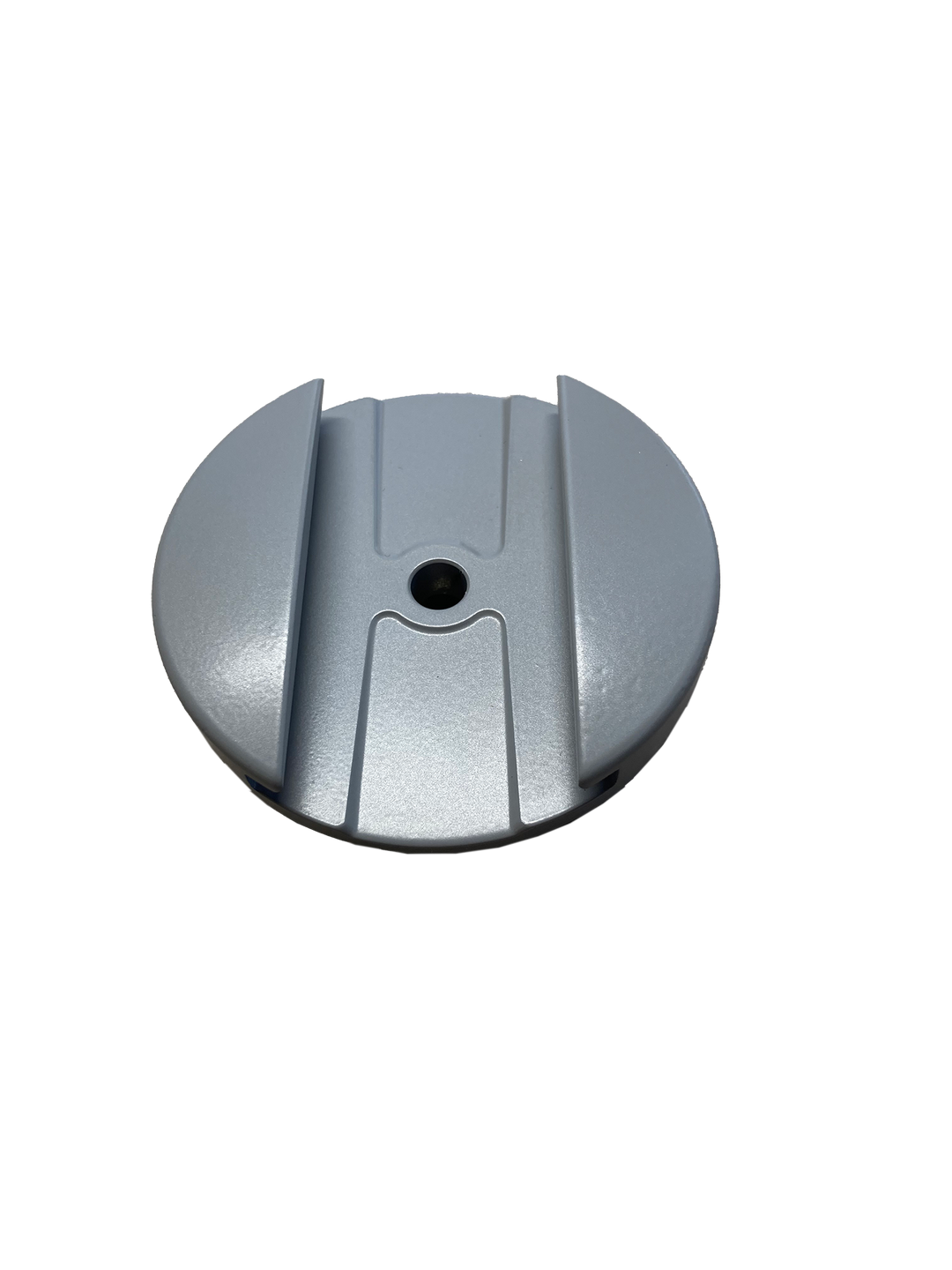 Ein grauer Kreis mit einem Loch in der Mitte auf weißem Hintergrund.