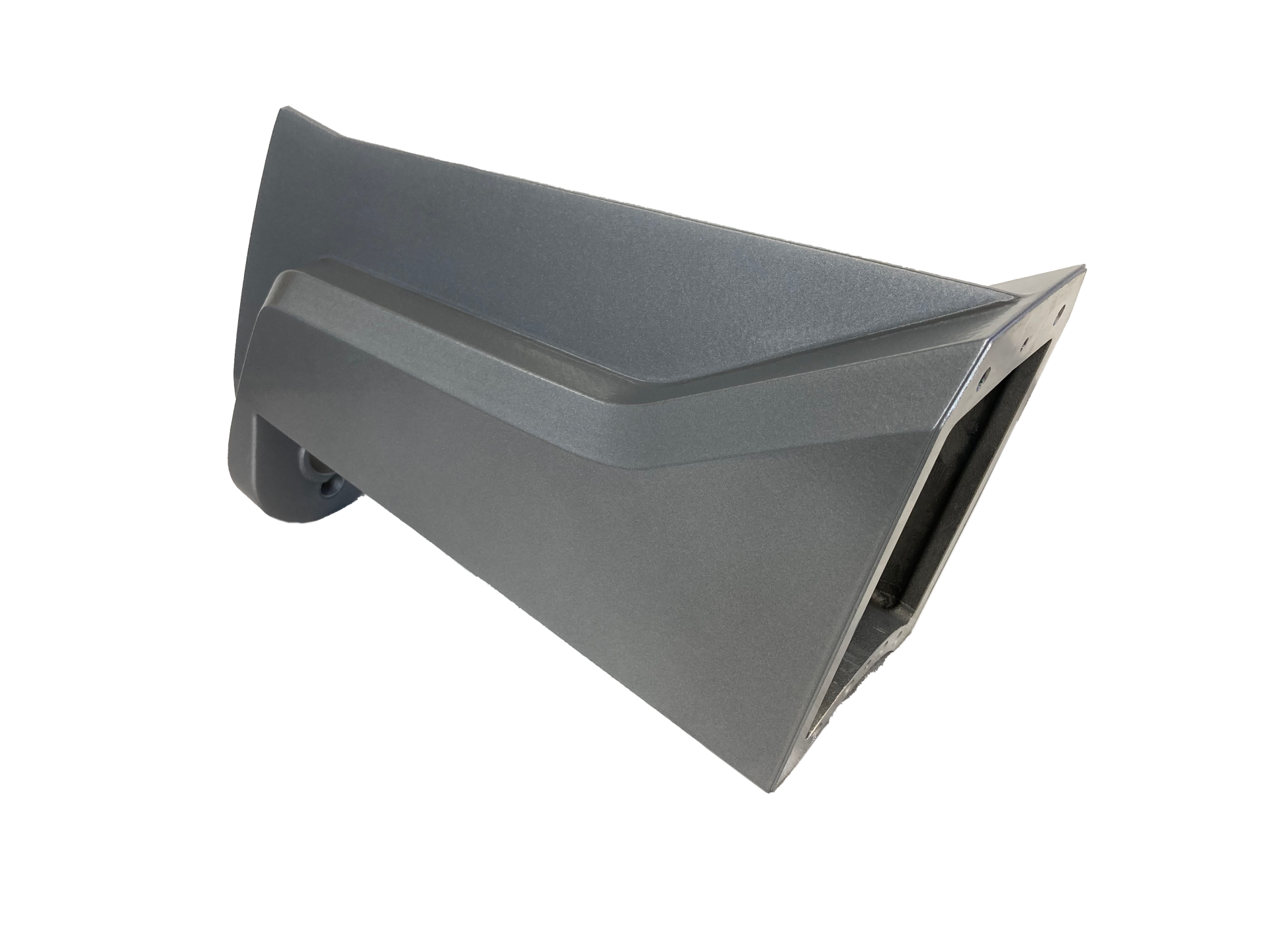 Ein grauer Gegenstand liegt auf einer weißen Fläche