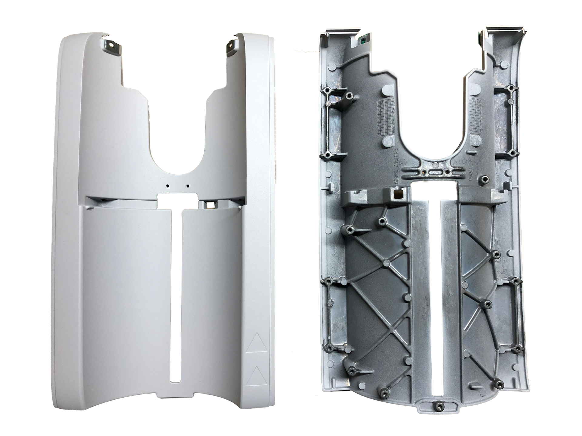 Ein weißer und grauer Plastikgegenstand mit einem darauf.