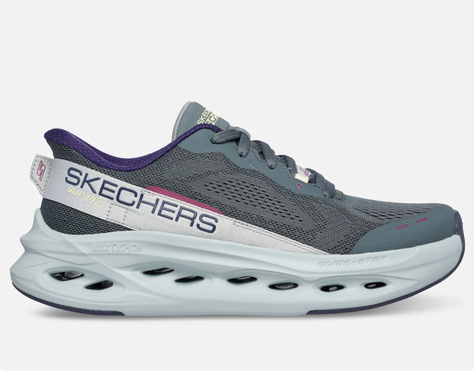 Harmaat Skechers-urheilukengät, joissa on paksu valkoinen pehmustettu pohja ja violetit yksityiskohdat, sivukuva