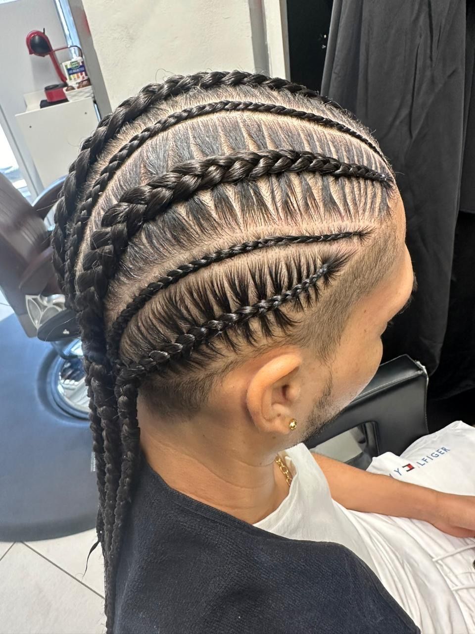 Tresses sur cheveux d'homme