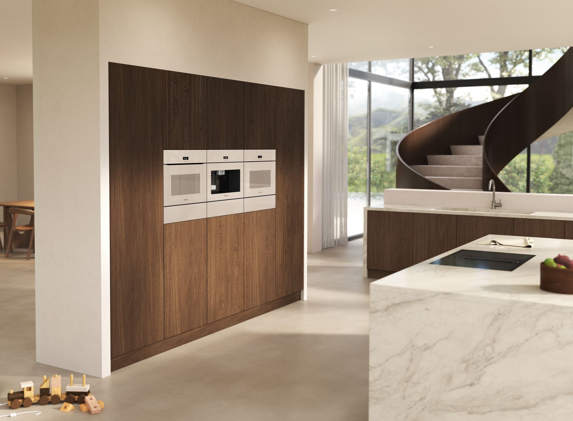 Trois appareils de cuisson intégrés dans un mur