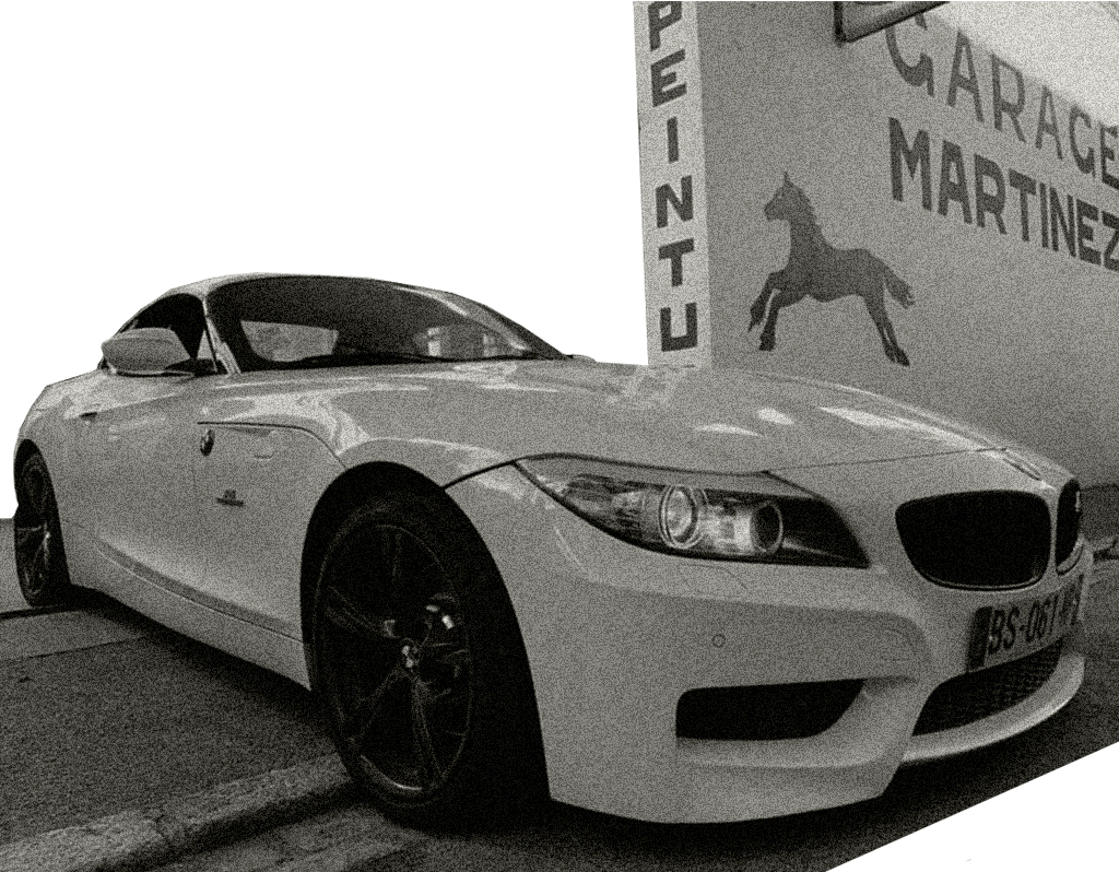 BMW devant le garage MARTINEZ