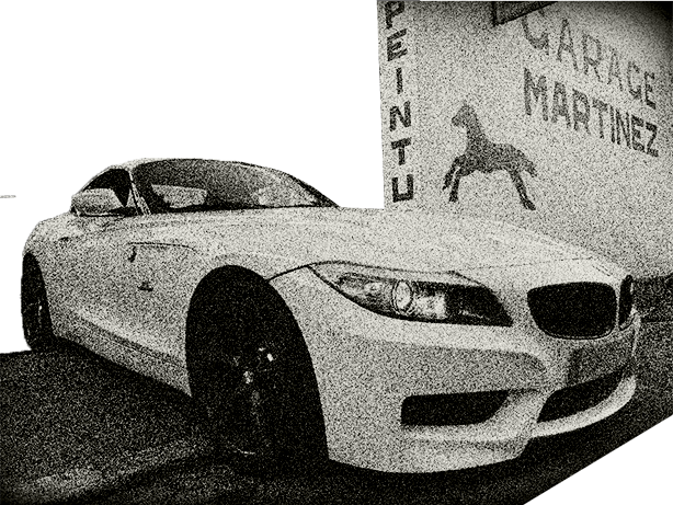 BMW devant le garage MARTINEZ