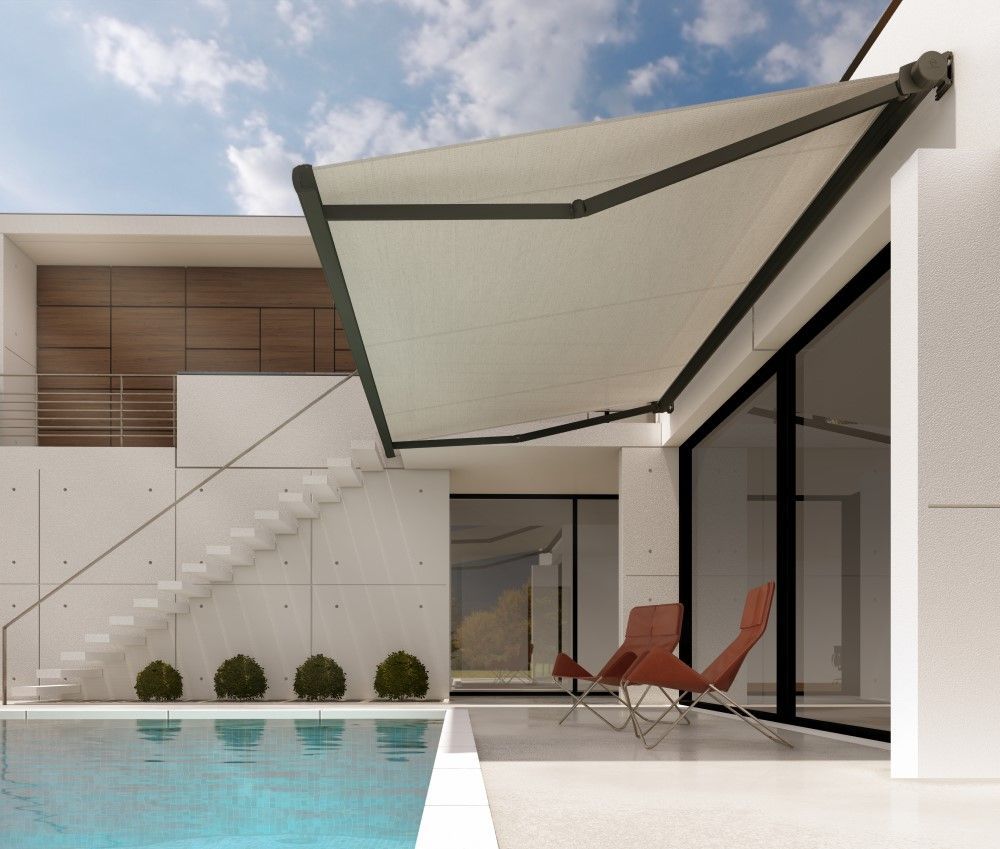 Un coin cuisine lumineux et moderne avec des placards en bois, des plans de travail blancs, un évier et des fenêtres habillées de stores blancs.