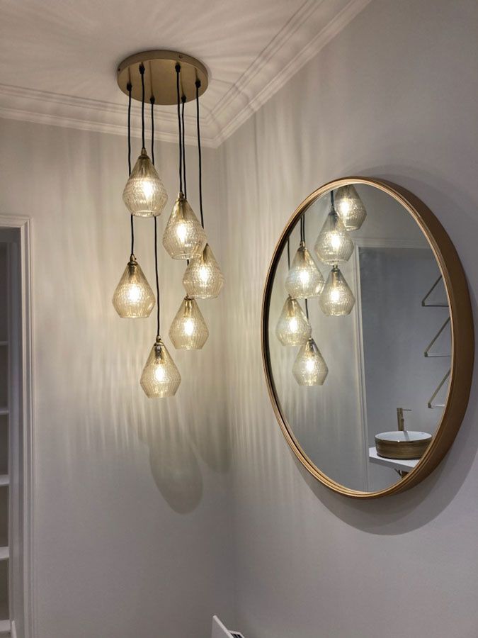Miroir rond avec un lustre à 6 ampoules