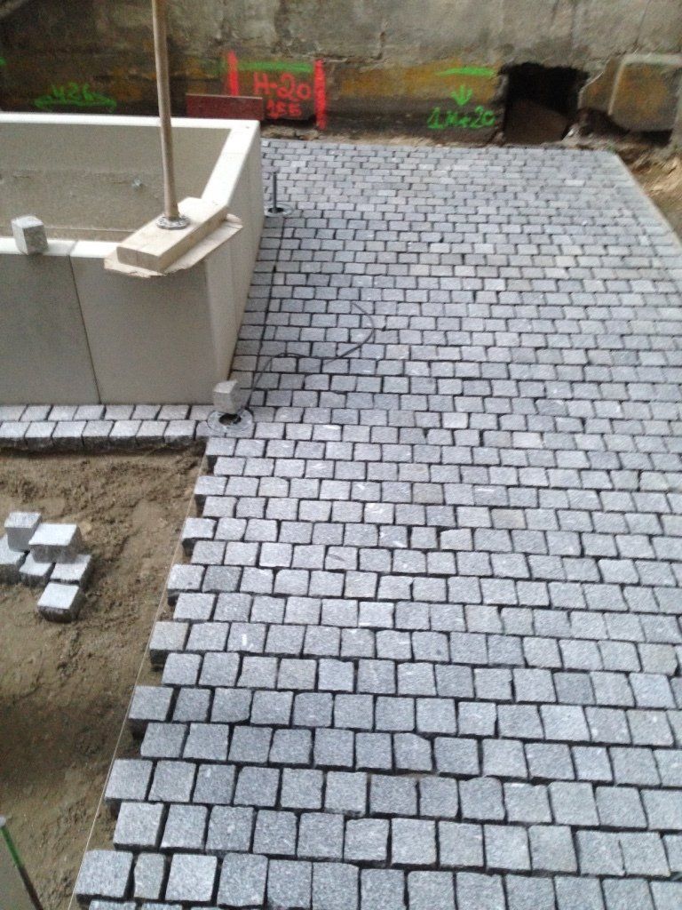 Pose de pavés granit gris