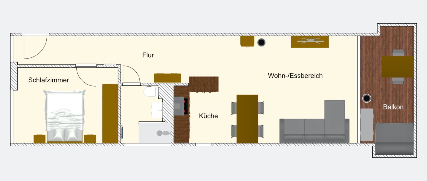 Grundriss der Ferienwohnung mit Schlafzimmer, Bad, Küche, Wohn- und Essbereich sowie Balkon