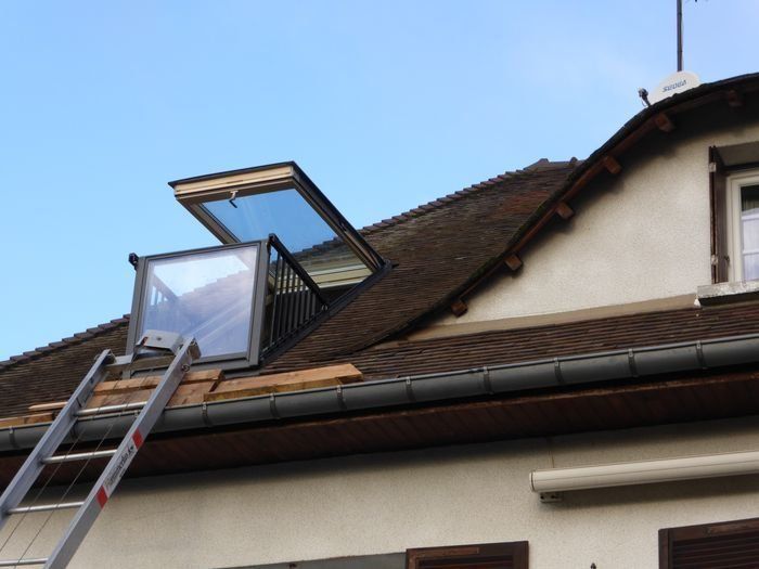 Pose de verrière balcon