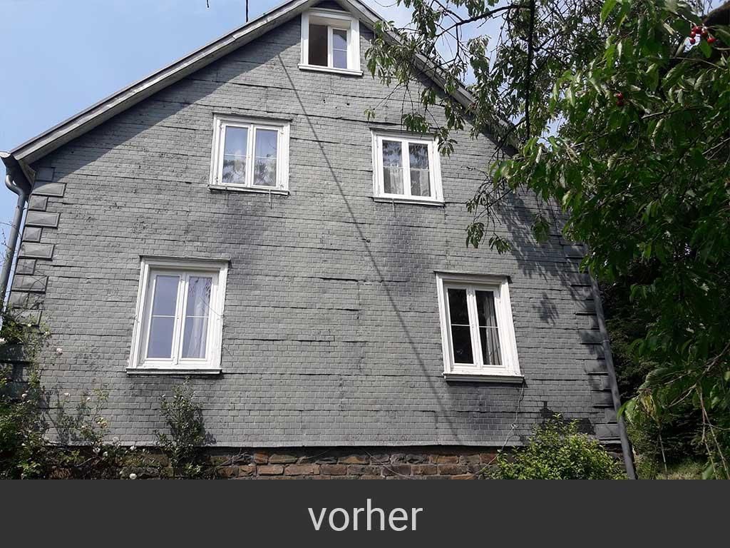 Ein Haus mit vielen Fenstern und dem Wort „Vorher“ auf der Unterseite