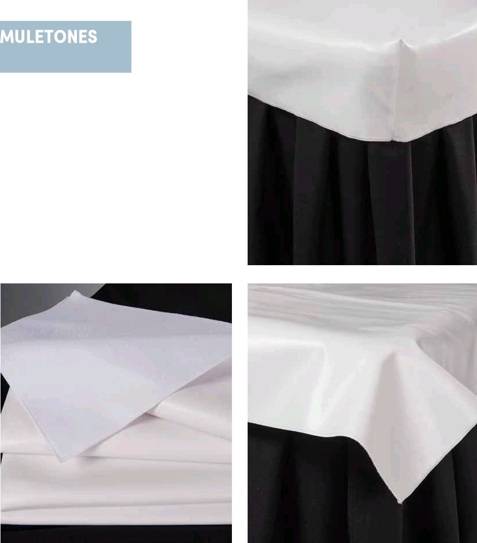 Un mantel blanco con un borde negro está sobre una mesa.