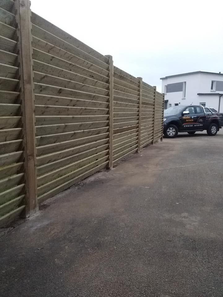 Clôture en bois persienne