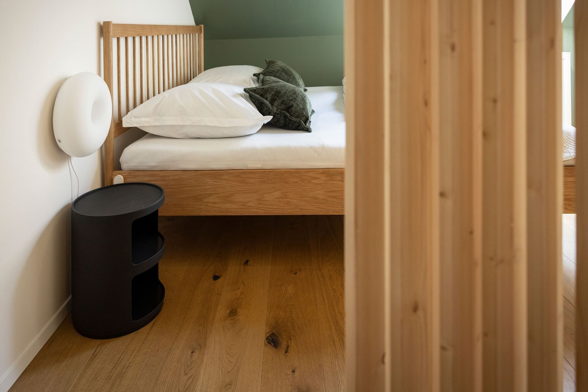 Schlafbereich im Design-Apartment Hartberg in der Oststeiermark